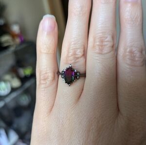 Dark ring size 6 green/red gem